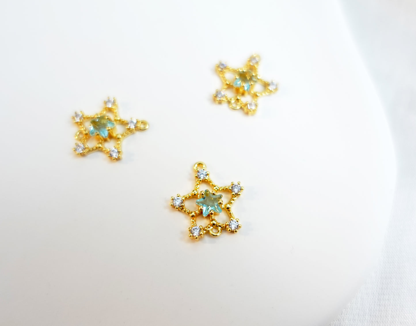 Zircon stone Star with double circle charm