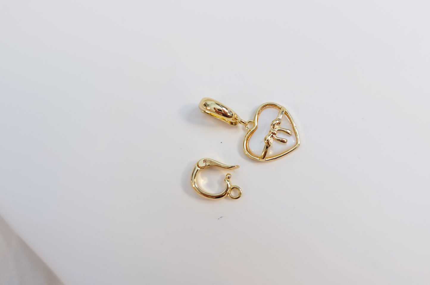 Mother of pearl Heart Ribbon Charm