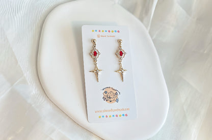 Four Point Star Ruby Tassel Earrings