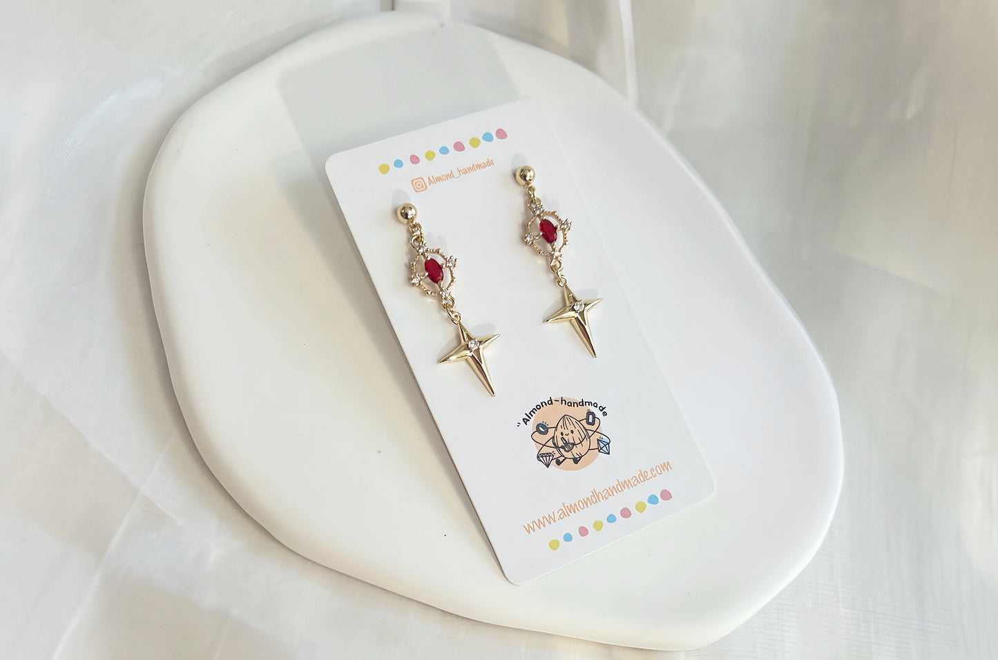 Four Point Star Ruby Tassel Earrings