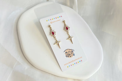 Four Point Star Ruby Tassel Earrings